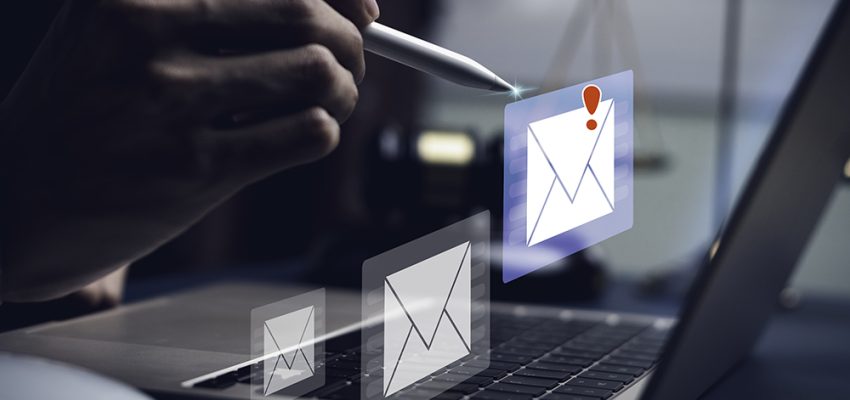 Businessman touching smartphone with open e-mail, receiving busi